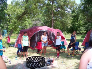Sicangu teen girls participating in an awareness activity at Ghost Hawk Park in 2014